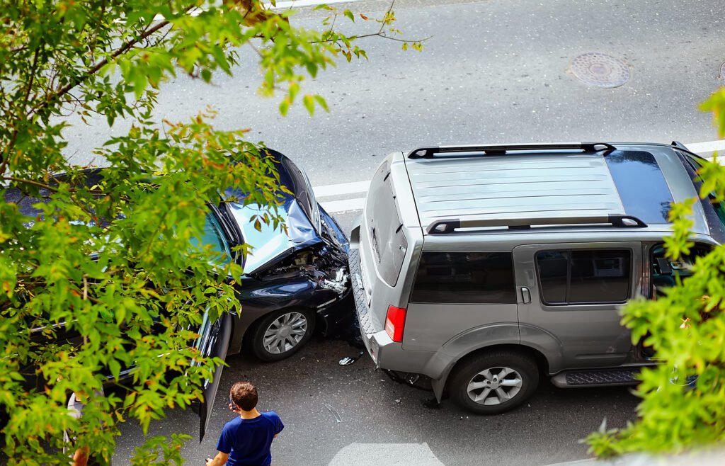 automobile crash accident on street, damaged cars after collision in city