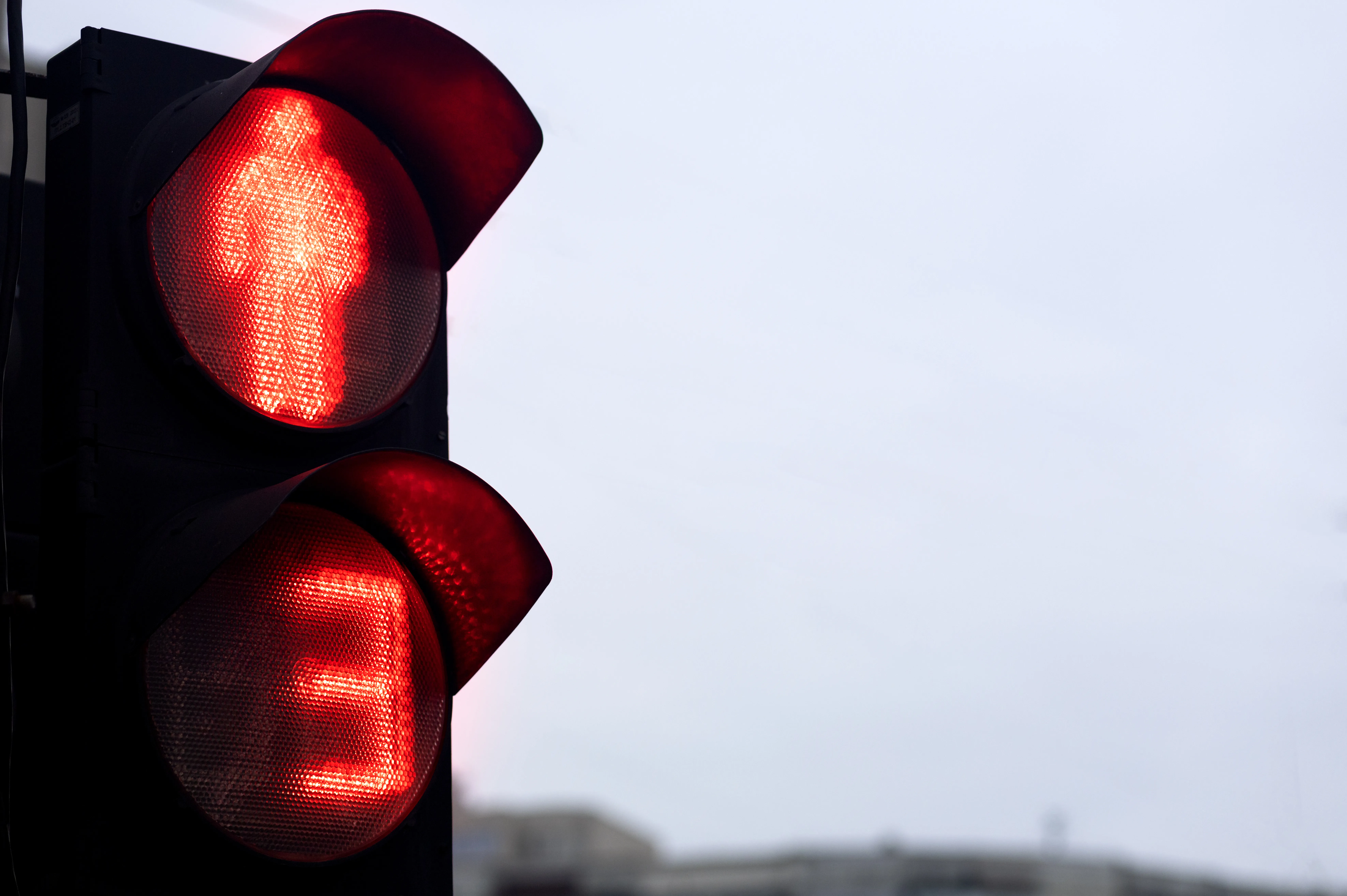 red light sign pedestrian crossing city